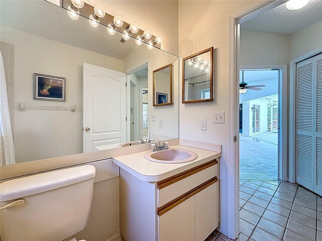 2973 Spring Oak Ct, Palm Harbor, FL 34684 - bathroom featuring vanity, tile patterned flooring, and a ceiling fan