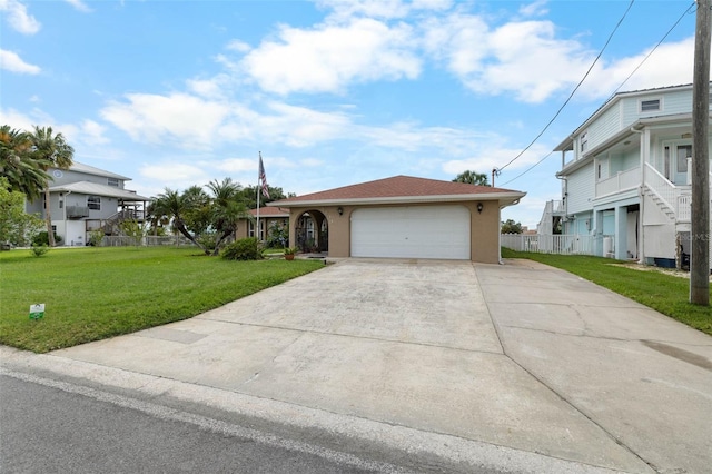 4299 Bellaire Dr, Hernando Beach, FL 34607 - view of front facade with concrete driveway, a garage, and stucco siding
