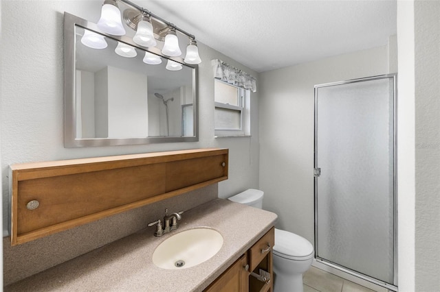 4299 Bellaire Dr, Hernando Beach, FL 34607 - full bathroom with toilet, a stall shower, vanity, and tile patterned flooring