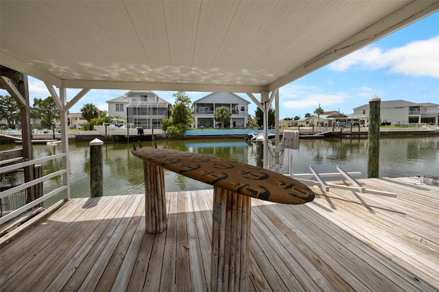 4299 Bellaire Dr, Hernando Beach, FL 34607 - dock area featuring a water view and a residential view