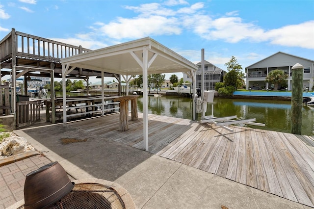 4299 Bellaire Dr, Hernando Beach, FL 34607 - dock featuring boat lift and a water view