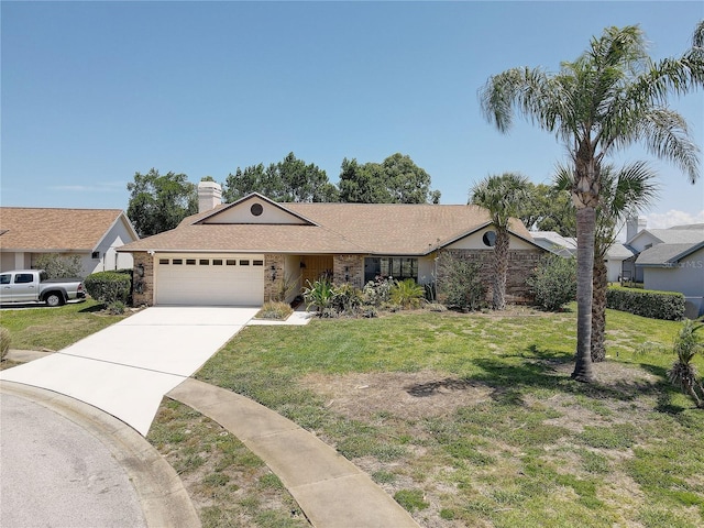 8521 Caitlin Ct, Hudson, FL 34667 - ranch-style house featuring an attached garage, a front lawn, and driveway
