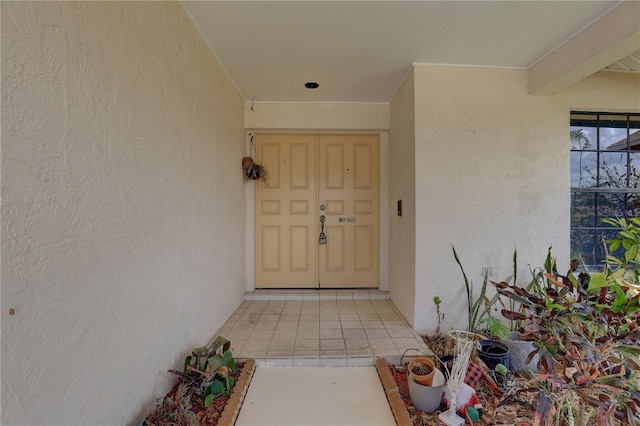 8521 Caitlin Ct, Hudson, FL 34667 - doorway to property with stucco siding