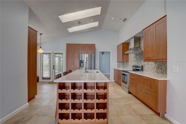 8521 Caitlin Ct, Hudson, FL 34667 - kitchen with wall chimney range hood, appliances with stainless steel finishes, a sink, a skylight, and backsplash