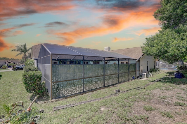 8521 Caitlin Ct, Hudson, FL 34667 - outdoor structure at dusk featuring a yard