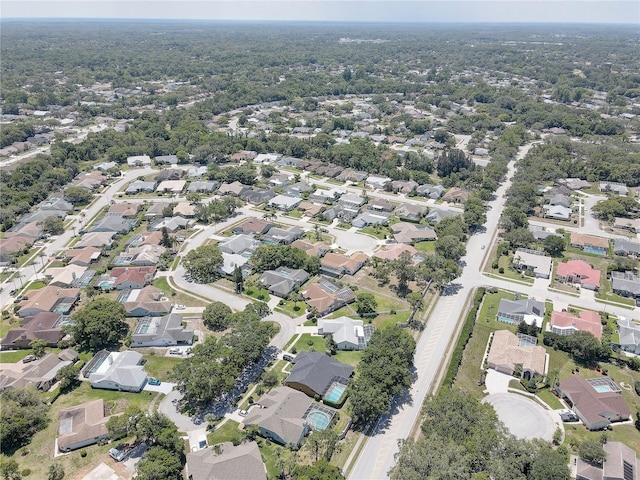 8521 Caitlin Ct, Hudson, FL 34667 - aerial overview of property's location featuring nearby suburban area