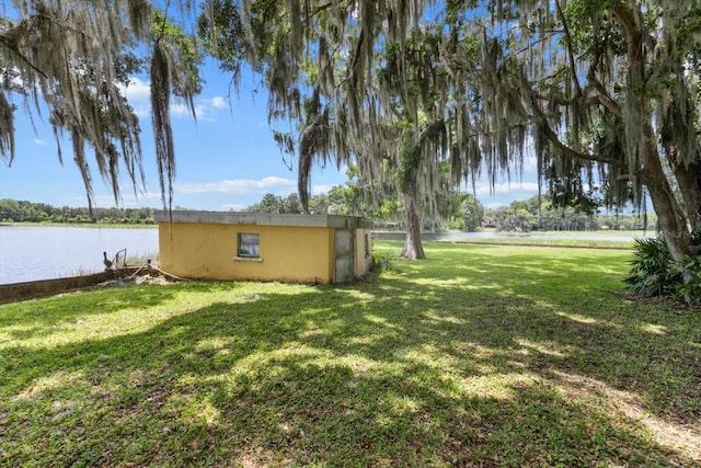 1226 S Telephone Point Rd, Inverness, FL 34450 - view of grassy yard featuring a water view