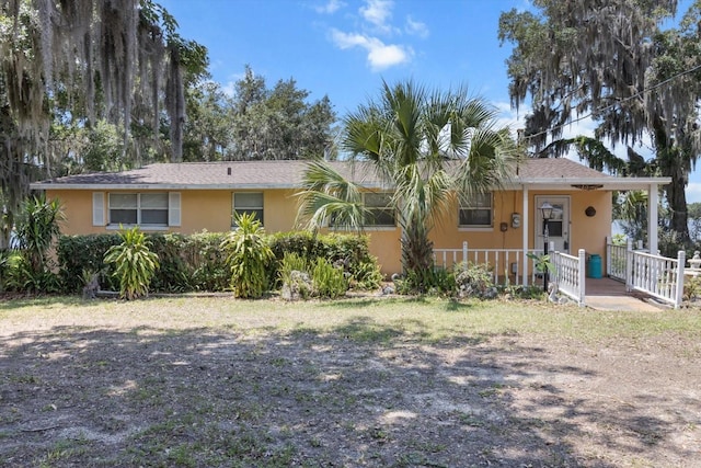 1226 S Telephone Point Rd, Inverness, FL 34450 - single story home with stucco siding