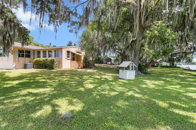 1226 S Telephone Point Rd, Inverness, FL 34450 - view of grassy yard featuring central AC unit