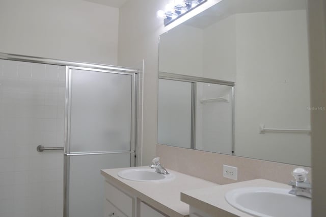 1922 Sassafras Dr, Wesley Chapel, FL 33543 - bathroom with double vanity and a tile shower