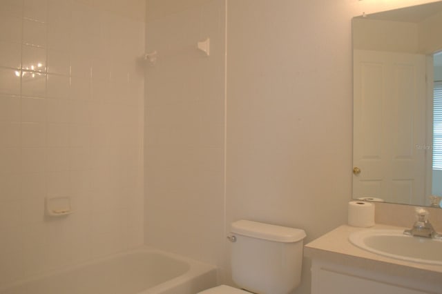 1922 Sassafras Dr, Wesley Chapel, FL 33543 - bathroom featuring toilet, vanity, and tub / shower combination