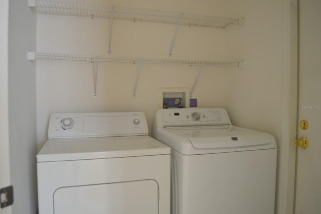 1922 Sassafras Dr, Wesley Chapel, FL 33543 - washroom with separate washer and dryer