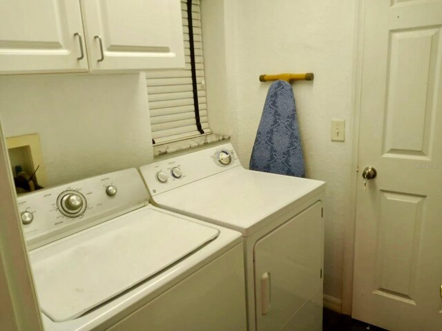 21103 Patio View Ct Unit 3302, Lutz, FL 33558 - laundry room featuring washer and clothes dryer and cabinet space