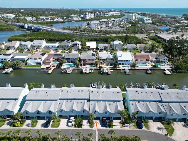 659 Garland Cir, Indian Rocks Beach, FL 33785 - aerial perspective of suburban area with a nearby body of water