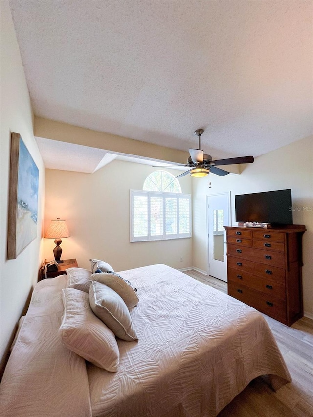 659 Garland Cir, Indian Rocks Beach, FL 33785 - bedroom with light wood-type flooring, ceiling fan, and baseboards