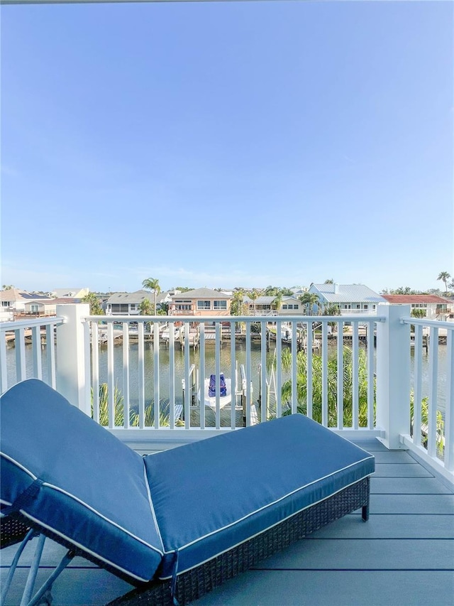 659 Garland Cir, Indian Rocks Beach, FL 33785 - wooden terrace featuring a water view and a residential view