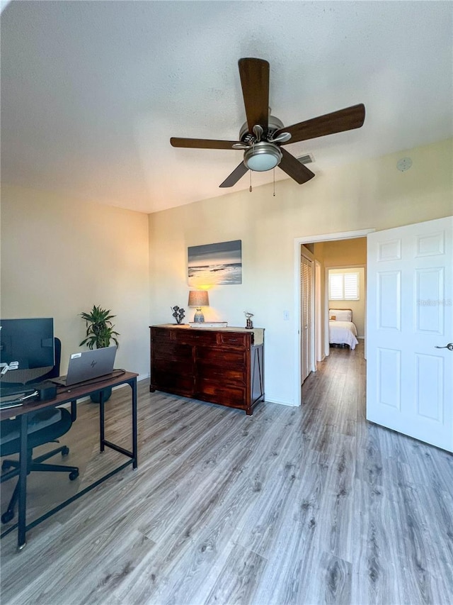 659 Garland Cir, Indian Rocks Beach, FL 33785 - office area with a ceiling fan, wood finished floors, and baseboards