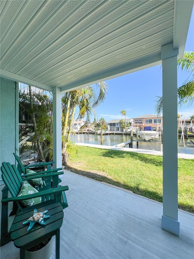 659 Garland Cir, Indian Rocks Beach, FL 33785 - view of patio / terrace featuring a water view