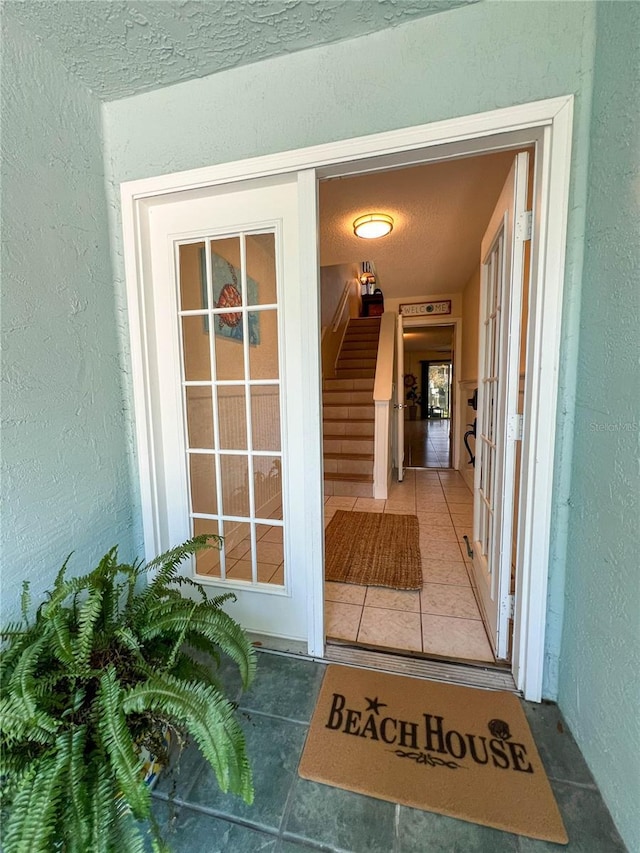 659 Garland Cir, Indian Rocks Beach, FL 33785 - property entrance with stucco siding
