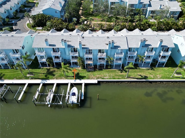 659 Garland Cir, Indian Rocks Beach, FL 33785 - aerial perspective of suburban area featuring a large body of water