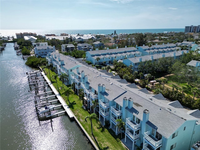 659 Garland Cir, Indian Rocks Beach, FL 33785 - drone / aerial view of a large body of water and apartment complex / building
