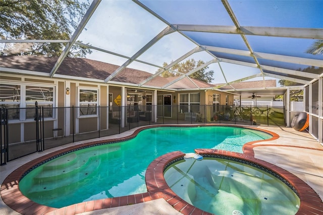 2507 Dewberry St, Valrico, FL 33596 - view of pool with a pool with connected hot tub, a patio area, ceiling fan, and glass enclosure
