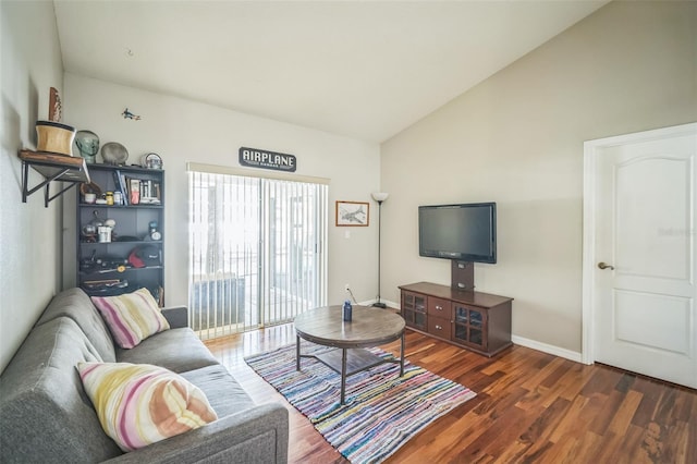 2507 Dewberry St, Valrico, FL 33596 - living area with wood finished floors, lofted ceiling, and baseboards
