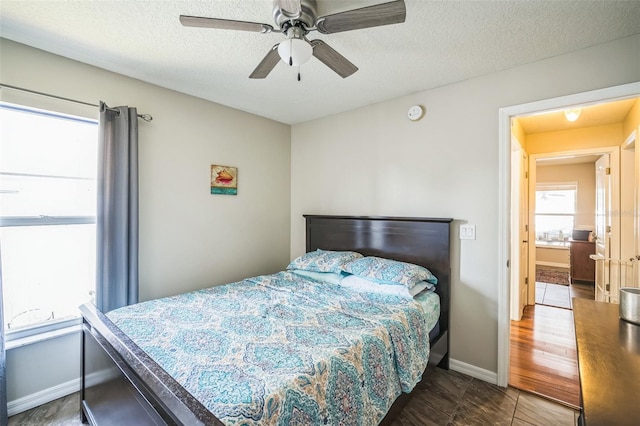 2507 Dewberry St, Valrico, FL 33596 - bedroom featuring a textured ceiling, baseboards, and ceiling fan