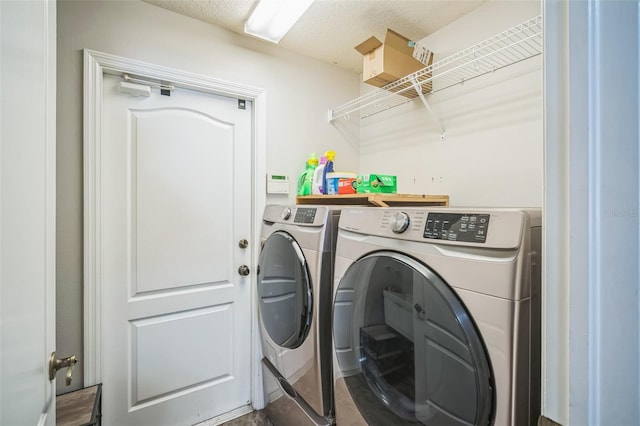 2507 Dewberry St, Valrico, FL 33596 - laundry area with separate washer and dryer and a textured ceiling