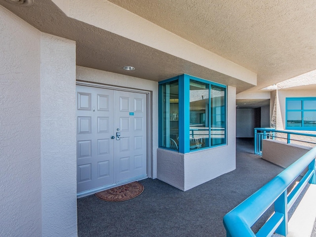 1520 Gulf Blvd Unit 1505, Clearwater Beach, FL 33767 - entrance to property with a balcony and stucco siding