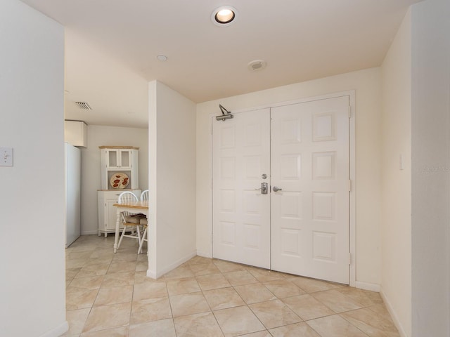 1520 Gulf Blvd Unit 1505, Clearwater Beach, FL 33767 - entrance foyer featuring light tile patterned floors, recessed lighting, and baseboards