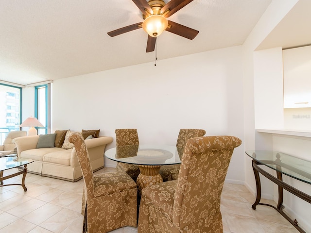 1520 Gulf Blvd Unit 1505, Clearwater Beach, FL 33767 - dining space featuring light tile patterned floors and a ceiling fan
