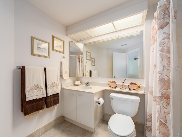 1520 Gulf Blvd Unit 1505, Clearwater Beach, FL 33767 - bathroom featuring vanity, toilet, tile patterned floors, a shower with curtain, and baseboards