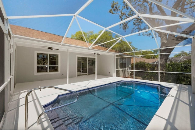 970 Ridgewood Ter, Tarpon Springs, FL 34689 - swimming pool featuring a ceiling fan, a patio, and glass enclosure