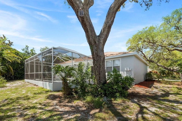 970 Ridgewood Ter, Tarpon Springs, FL 34689 - view of property exterior with glass enclosure