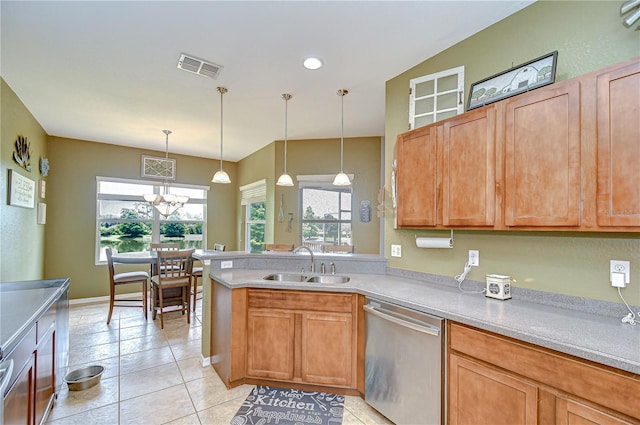 6519 Twin Bridges Dr, Zephyrhills, FL 33541 - kitchen with dishwasher, a sink, plenty of natural light, and light countertops