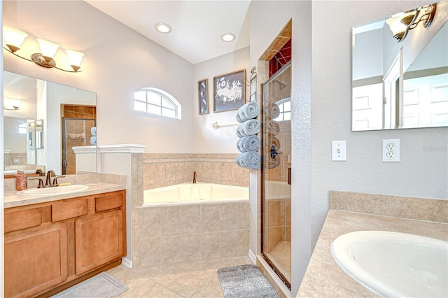 6519 Twin Bridges Dr, Zephyrhills, FL 33541 - bathroom featuring a bath, vanity, a tile shower, and tile patterned floors