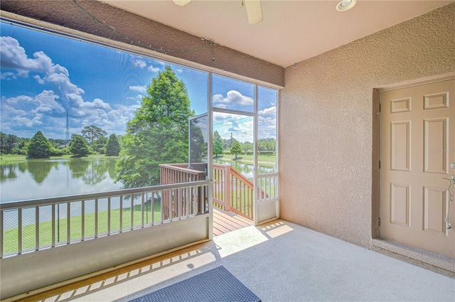 6519 Twin Bridges Dr, Zephyrhills, FL 33541 - unfurnished sunroom featuring a water view and view of wooded area