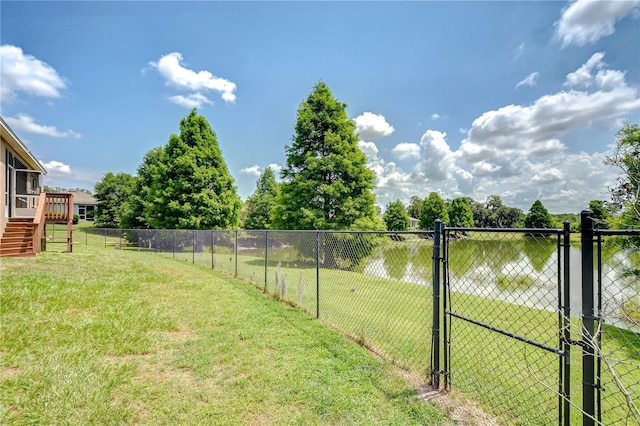 6519 Twin Bridges Dr, Zephyrhills, FL 33541 - view of yard with a gate, stairway, and a sunroom