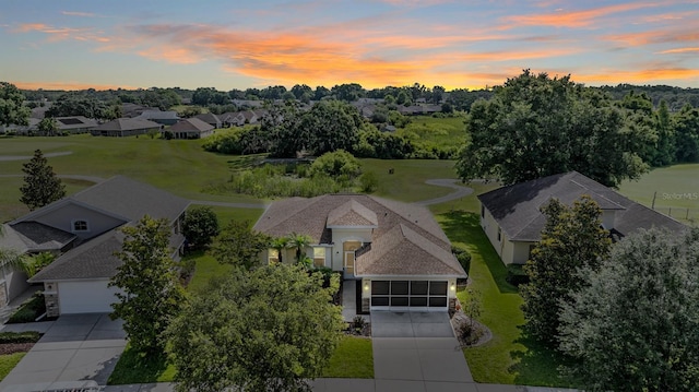 13238 Chipout Ln, Hudson, FL 34669 - aerial view at dusk of a residential view