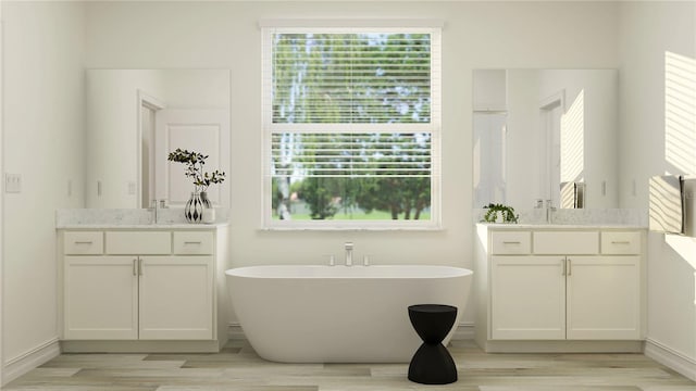 18154 Serene Lake Loop, Lutz, FL 33548 - full bathroom with wood finished floors, two vanities, and a freestanding bath