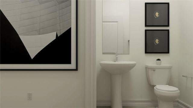 18154 Serene Lake Loop, Lutz, FL 33548 - bathroom with toilet and baseboards