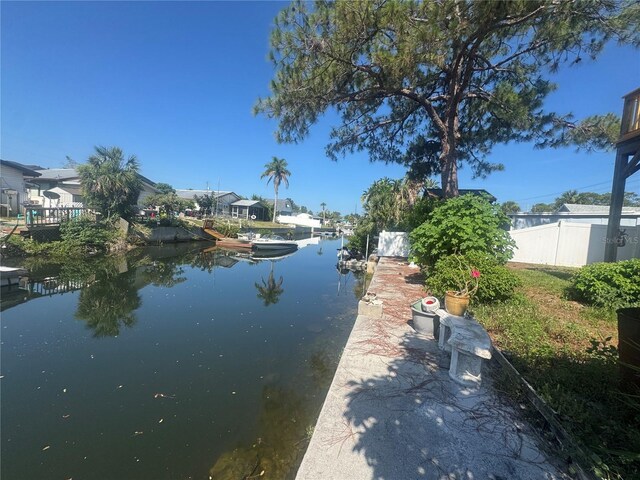 7330 New York Ave, Hudson, FL 34667 - water view featuring a boat dock
