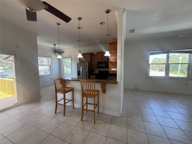 7330 New York Ave, Hudson, FL 34667 - kitchen featuring stainless steel fridge, a ceiling fan, black microwave, open shelves, and stove