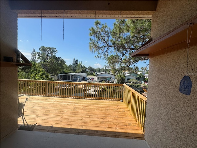 7330 New York Ave, Hudson, FL 34667 - wooden deck with a residential view