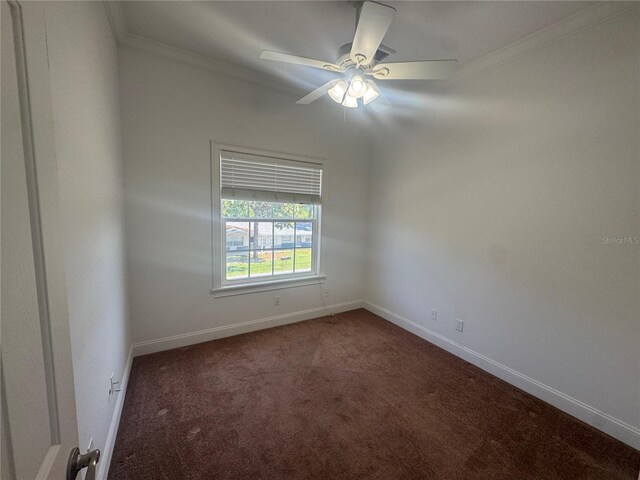 7330 New York Ave, Hudson, FL 34667 - empty room with dark carpet, ornamental molding, baseboards, and ceiling fan