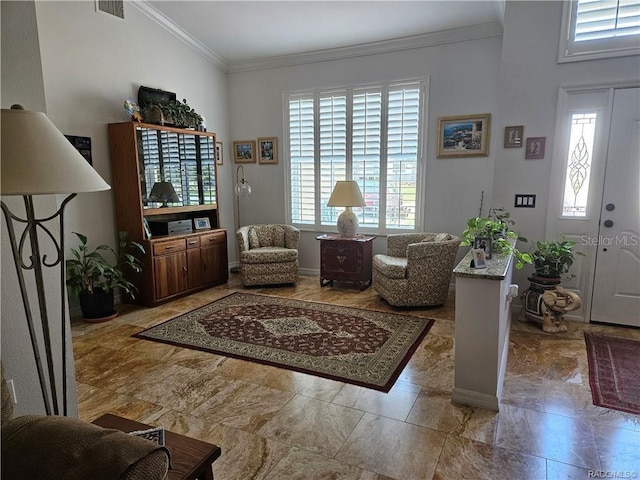 4755 N El Camino Dr, Beverly Hills, FL 34465 - foyer featuring crown molding, marble look tile flooring, and vaulted ceiling