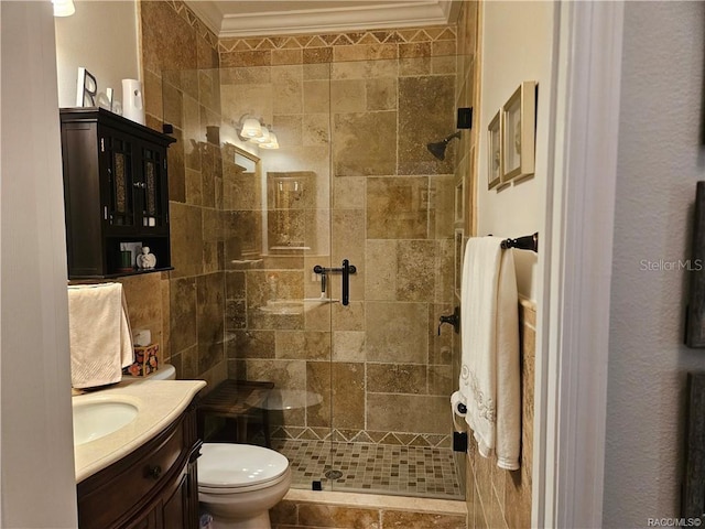 4755 N El Camino Dr, Beverly Hills, FL 34465 - bathroom featuring vanity, a stall shower, ornamental molding, and toilet