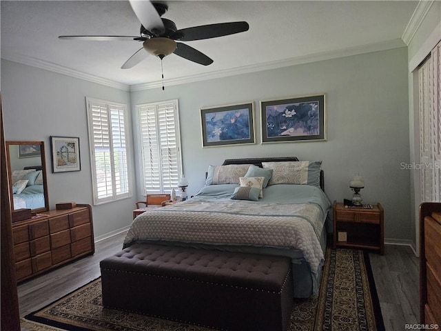 4755 N El Camino Dr, Beverly Hills, FL 34465 - bedroom with wood finished floors, crown molding, baseboards, and ceiling fan
