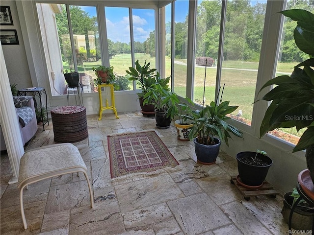 4755 N El Camino Dr, Beverly Hills, FL 34465 - sunroom / solarium with plenty of natural light and view of golf course